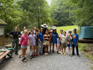 summer campers and Smoky Bear at the Outdoor Lab